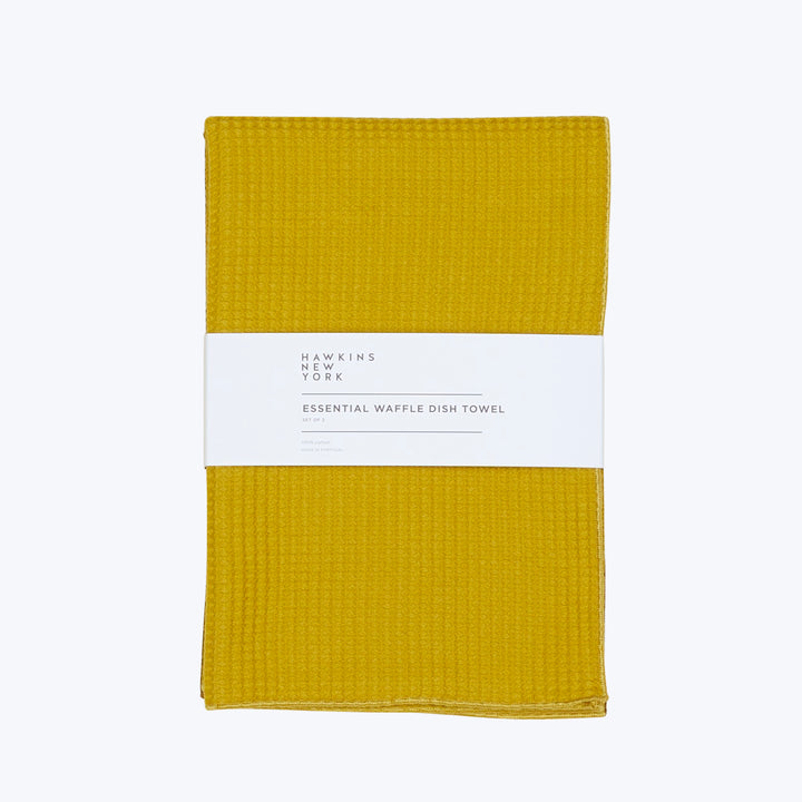 Mustard yellow waffle dish towel by Hawkins New York brand.