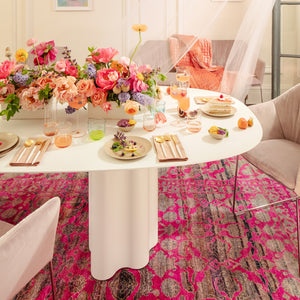 Contemporary oval table with white surface and minimalist design elements. - hover