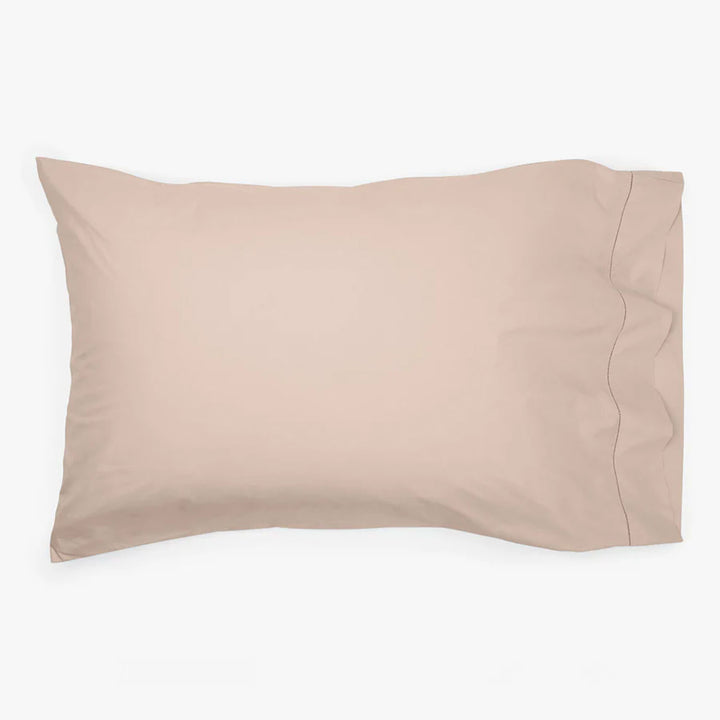 Rectangular pillowcase in soft, muted color on white background.