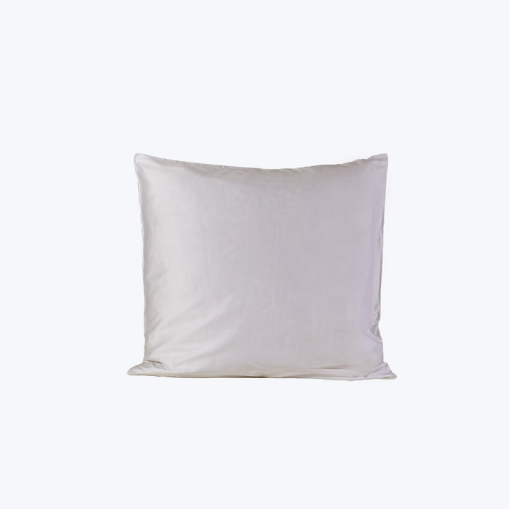 Plain white pillow on white background, standard size, soft texture