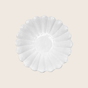 Scallop shell shaped dish with ridged pattern, glossy finish, decorative. - hover