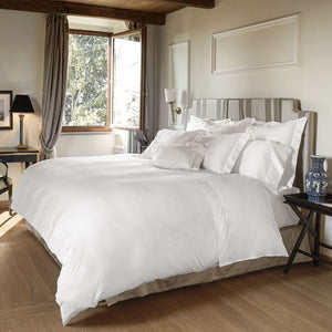 Set of white bedding items including duvet cover and pillowcases. - hover