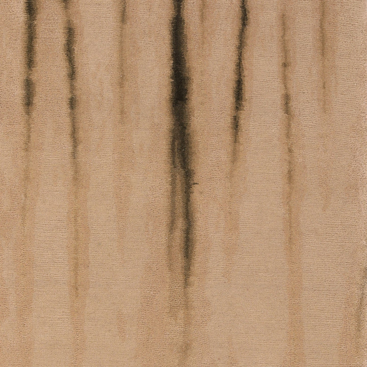 Close-up of textured surface with vertical streaks in warm beige.