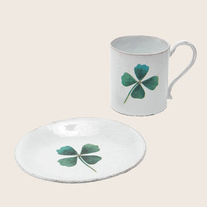 Vintage white mug with distressed finish and lucky four-leaf clover - hover