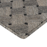 High-quality, plush gray carpet with textured pattern and finished edges.