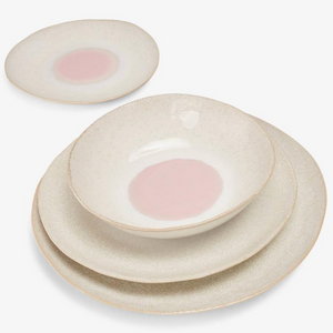 Handmade, textured bowl with a pale, glazed finish and subtle color gradation. - hover