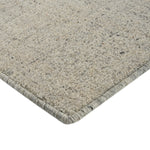 Close-up of high pile, soft carpet in neutral tones.
