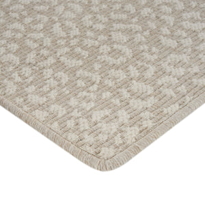 Close-up of two-toned geometric lattice rug with plush texture. - hover