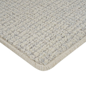 Close-up of beige heathered carpet with soft dense texture. - hover