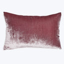 Rectangular crushed velvet throw pillow displaying a gradient of maroon to pink shades.