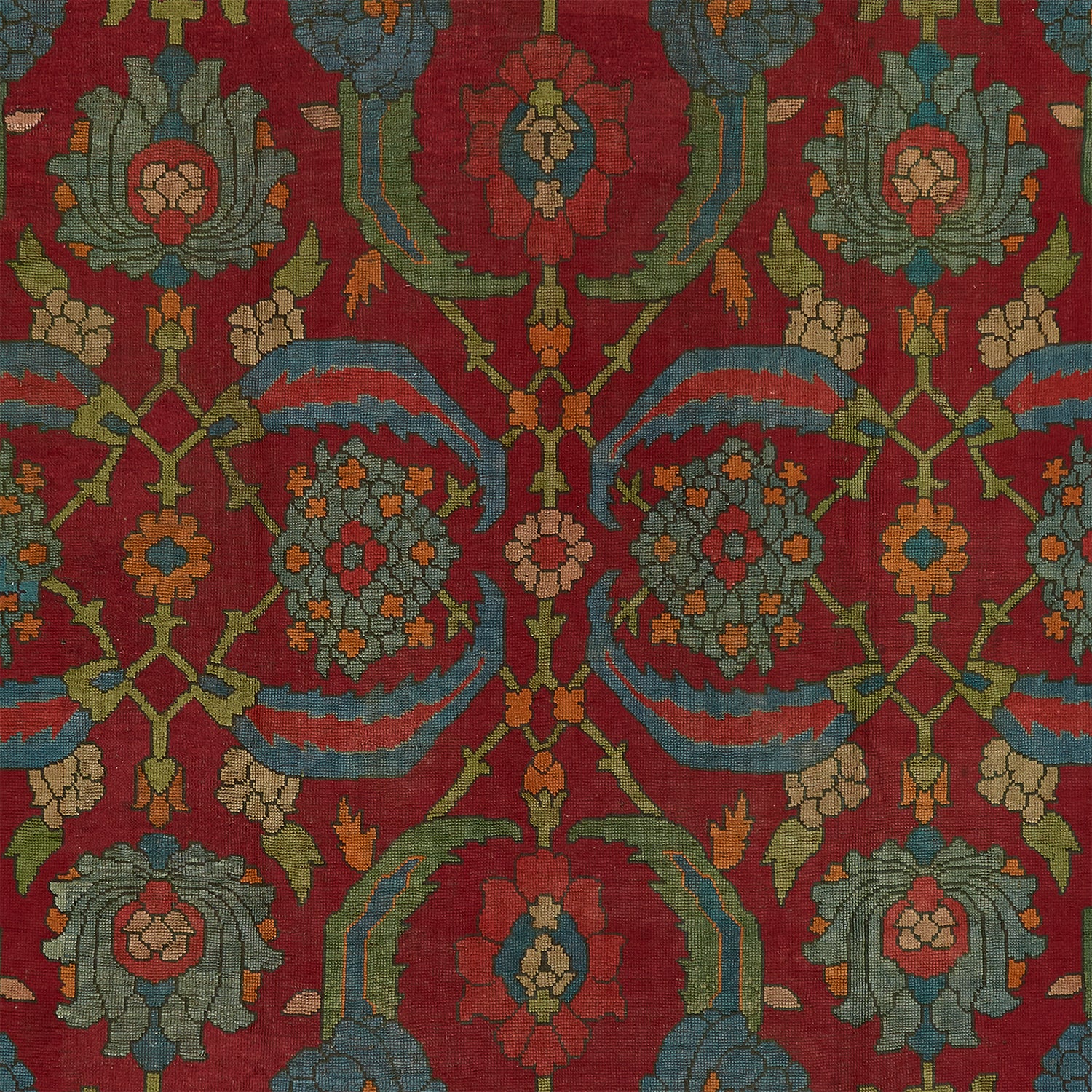 Symmetrical, ornamental carpet design with stylized floral motifs and vibrant colors.