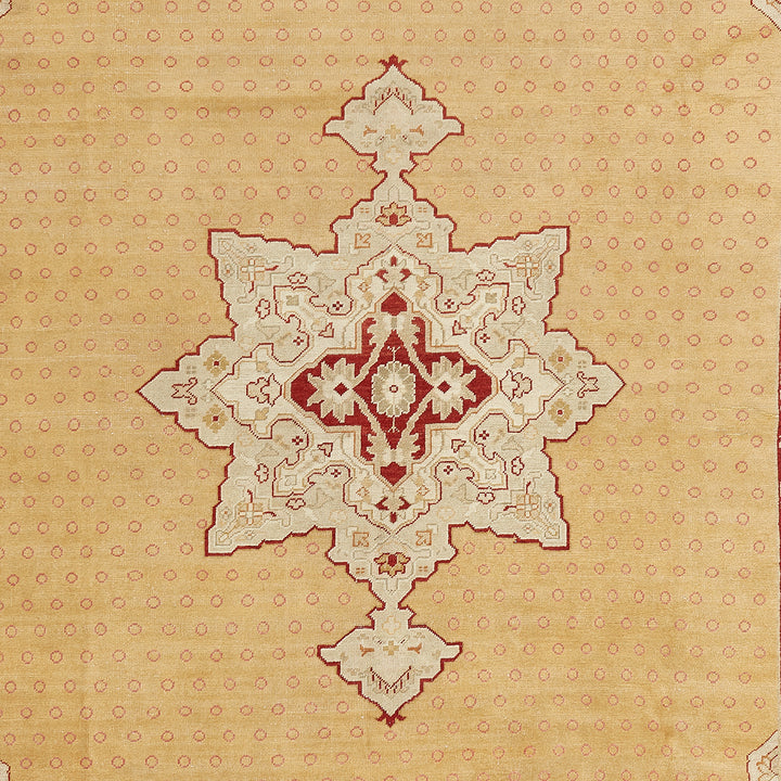 Intricate Middle Eastern-inspired carpet adorned with crimson star-like pattern.