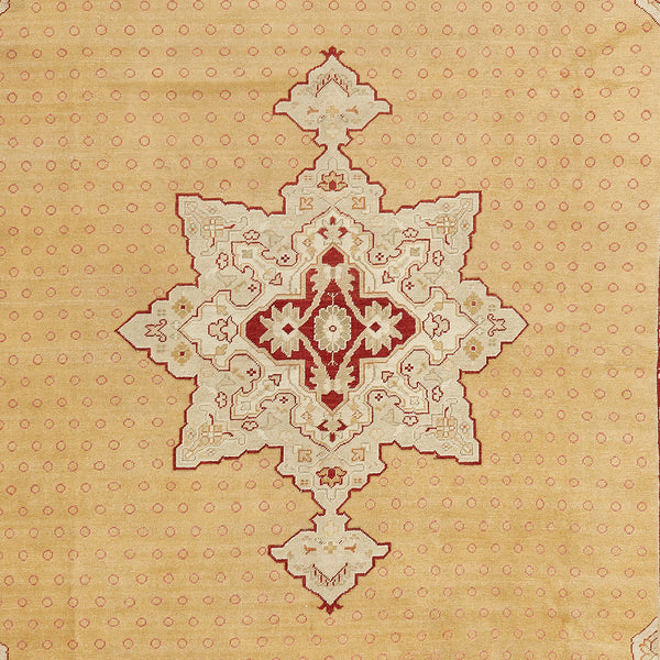 Intricate Middle Eastern-inspired carpet adorned with crimson star-like pattern.