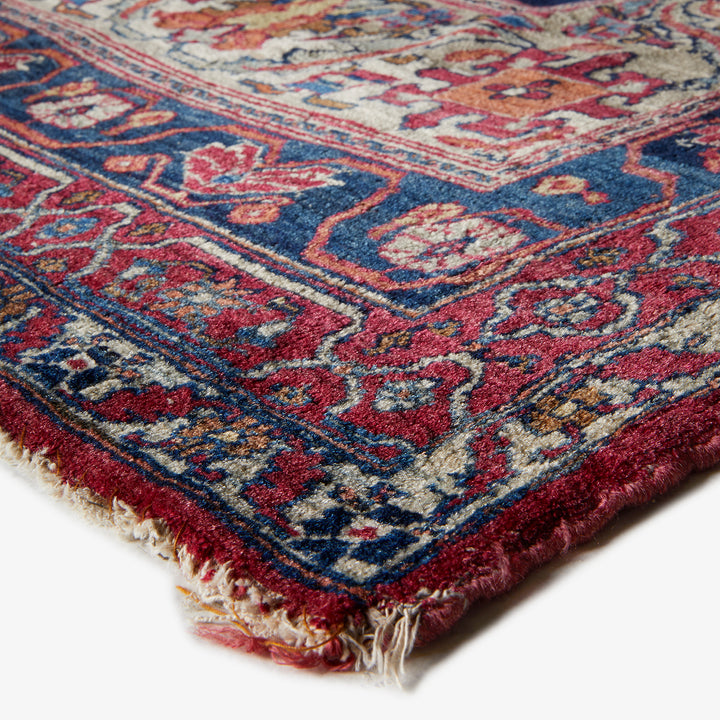 Close-up of a high-quality, patterned rug with intricate design