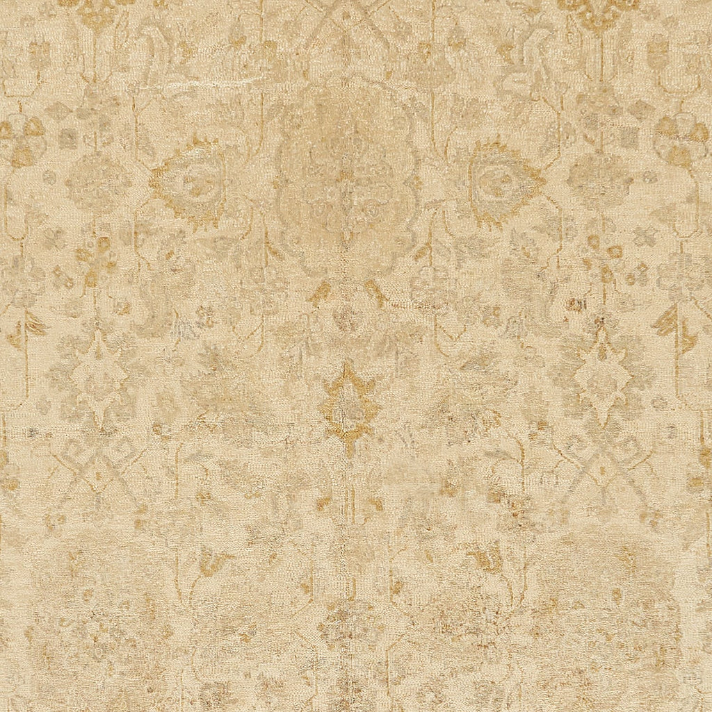 Elegant vintage textile with muted floral design in light brown.
