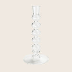 Elegant clear glass candlestick holder with spherical bulb stem design.