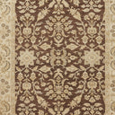 Close-up of intricately patterned, high-quality rug with traditional motifs.
