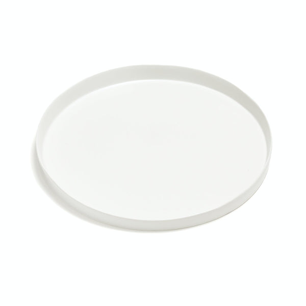Plain white plate with a subtle shadow against white background.