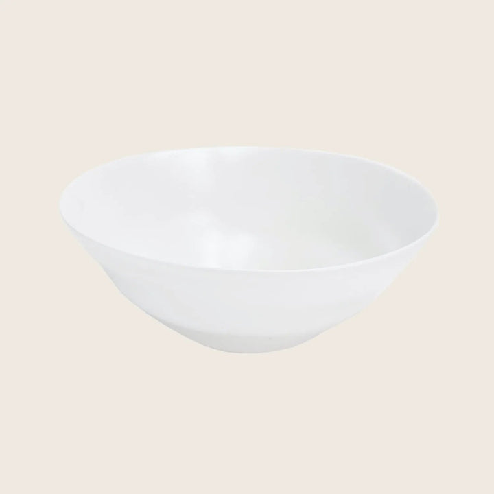 Minimalist white bowl with wide rim and shallow depth.