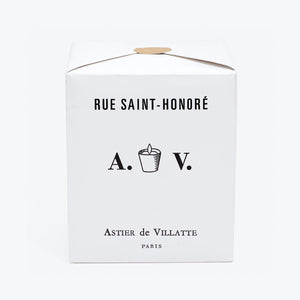 Luxurious scented candle in glass container with chic French label. - hover