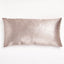 Rectangular pillow with metallic sheen, perfect for elegant home decor.