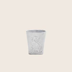 Embossed white cup with angelic figure design and floral patterns.