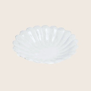 White scalloped dish with shell design, elegant and decorative piece.