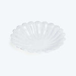 White scalloped dish with shell design, elegant and decorative piece.