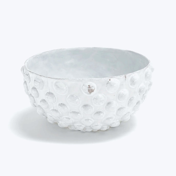 White bowl with bubbly texture, irregular edge, artisan quality design.