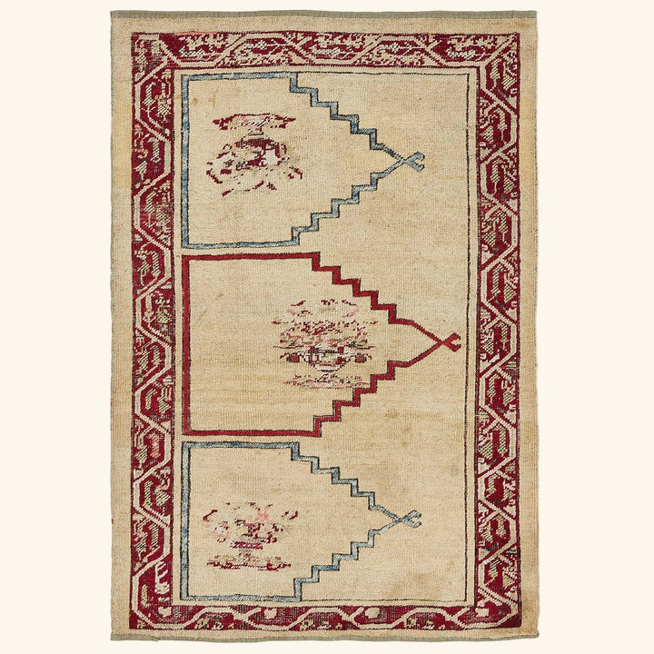 Traditional rug with distinctive pattern showcases Middle Eastern or Central Asian influences.