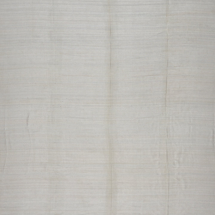 Plain white fabric with fine woven texture and subtle creases.
