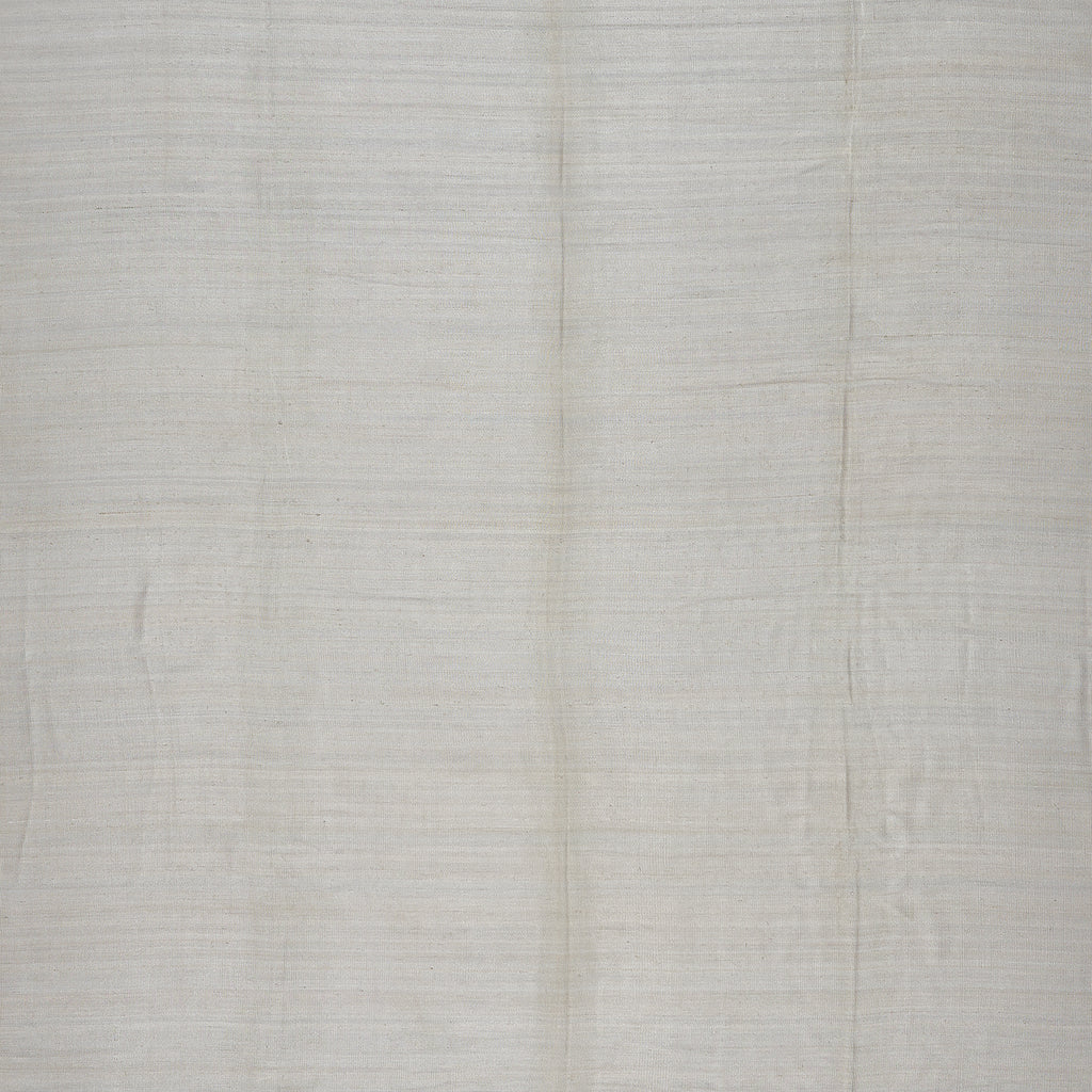 Plain white fabric with fine woven texture and subtle creases.