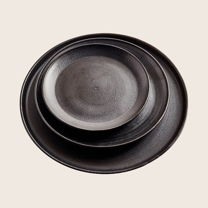 matte black dessert plate abc cocina restaurant handmade