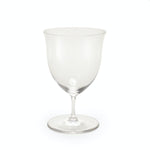 Transparent wine goblet on white background, devoid of color and contents.