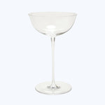 Classic martini glass with elegant design on a white backdrop.