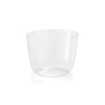 Minimalistic glass cup with sleek design on a white background.