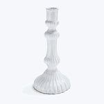 White glazed ceramic candlestick holder with traditional ribbed design.