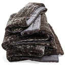 Plush, velvety dark blanket exudes luxury and comforting warmth.