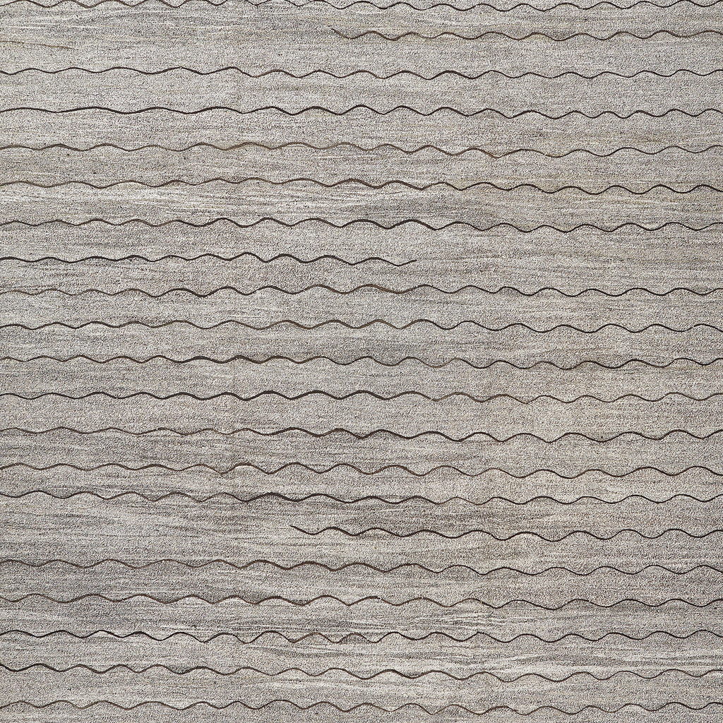Wavy, textured surface resembling corrugated metal or cardboard in gray.