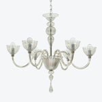Classic, ornate chandelier with multiple arms and elegant glass elements.