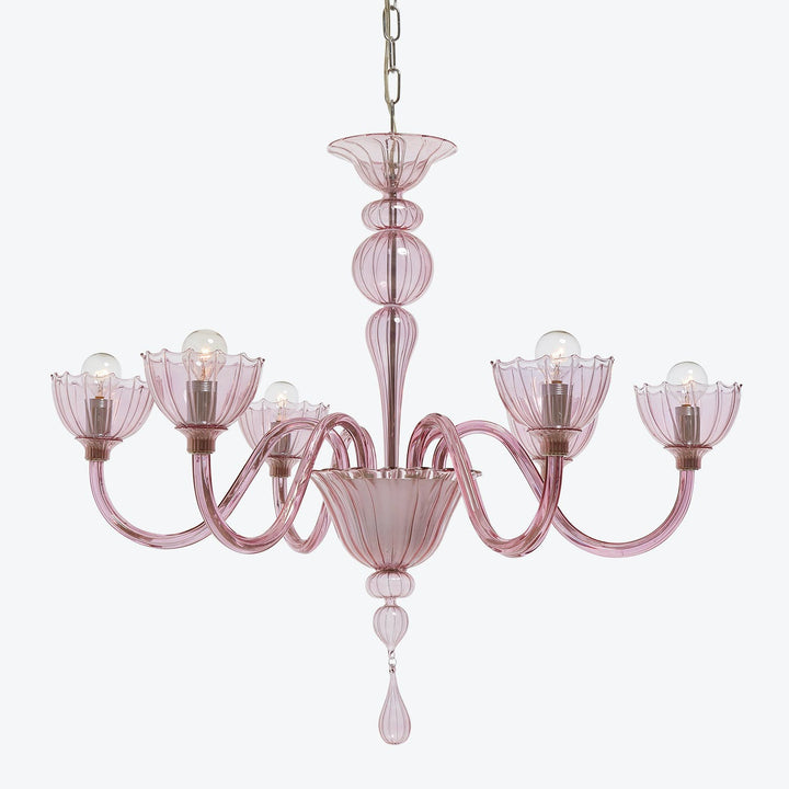 Elegant glass chandelier with pink hue and intricate design.