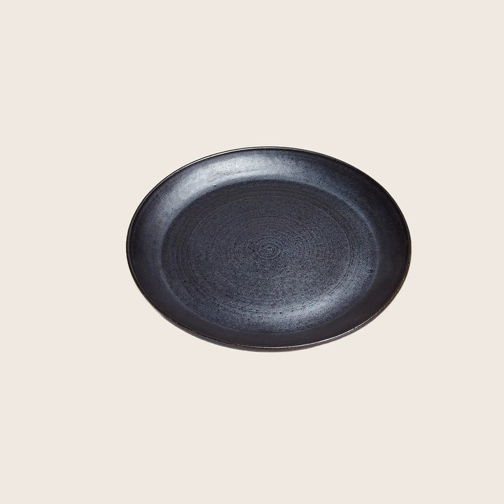 matte black dessert plate abc cocina restaurant handmade