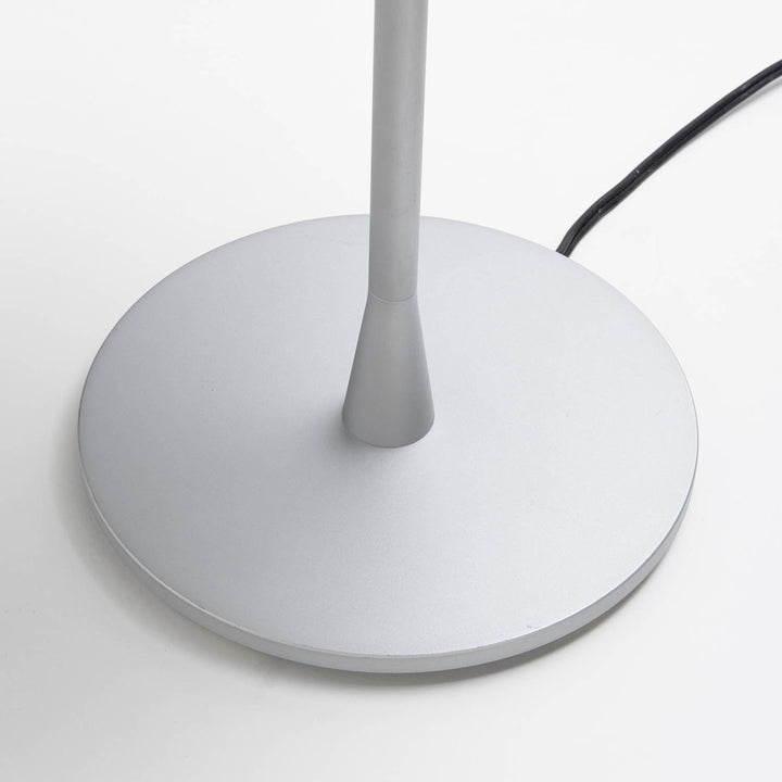 Sleek, modern device with minimalist design and silver color scheme.