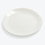Plain white dinner plate with a glossy finish, photographed solo.