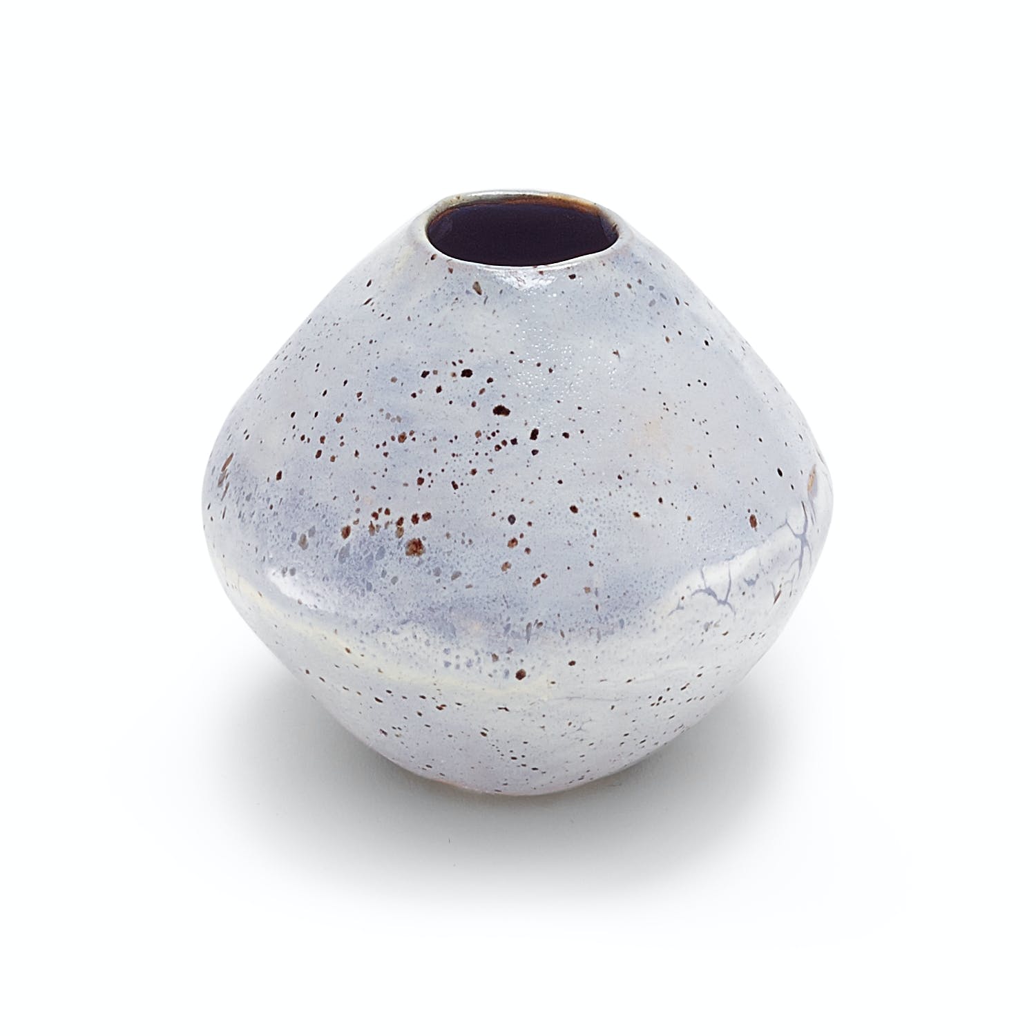 Hand-crafted ceramic vase with a rustic, speckled appearance on white background.