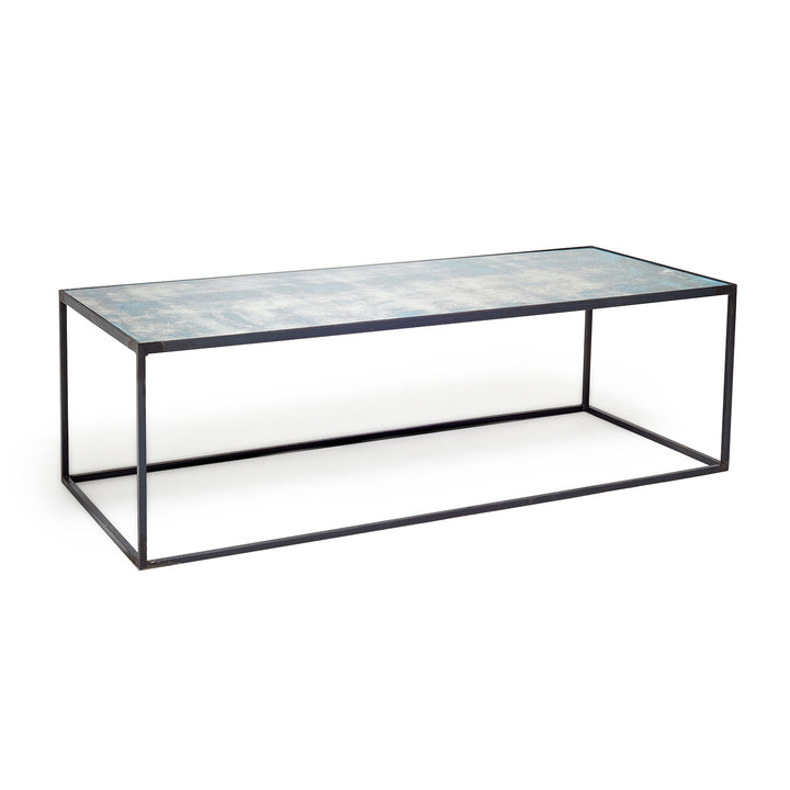 Modern minimalist coffee table with dark metal frame and mottled surface