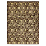 Elegant rectangular area rug with ornate floral and scroll motifs.