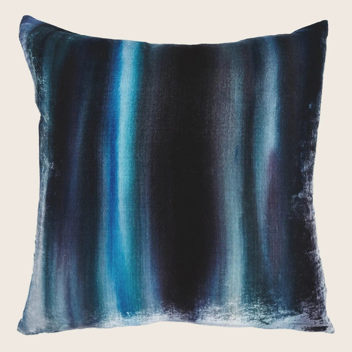 Modern gradient velvet pillow adds style to any home decor.