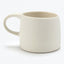 Simple off-white ceramic mug with a single handle