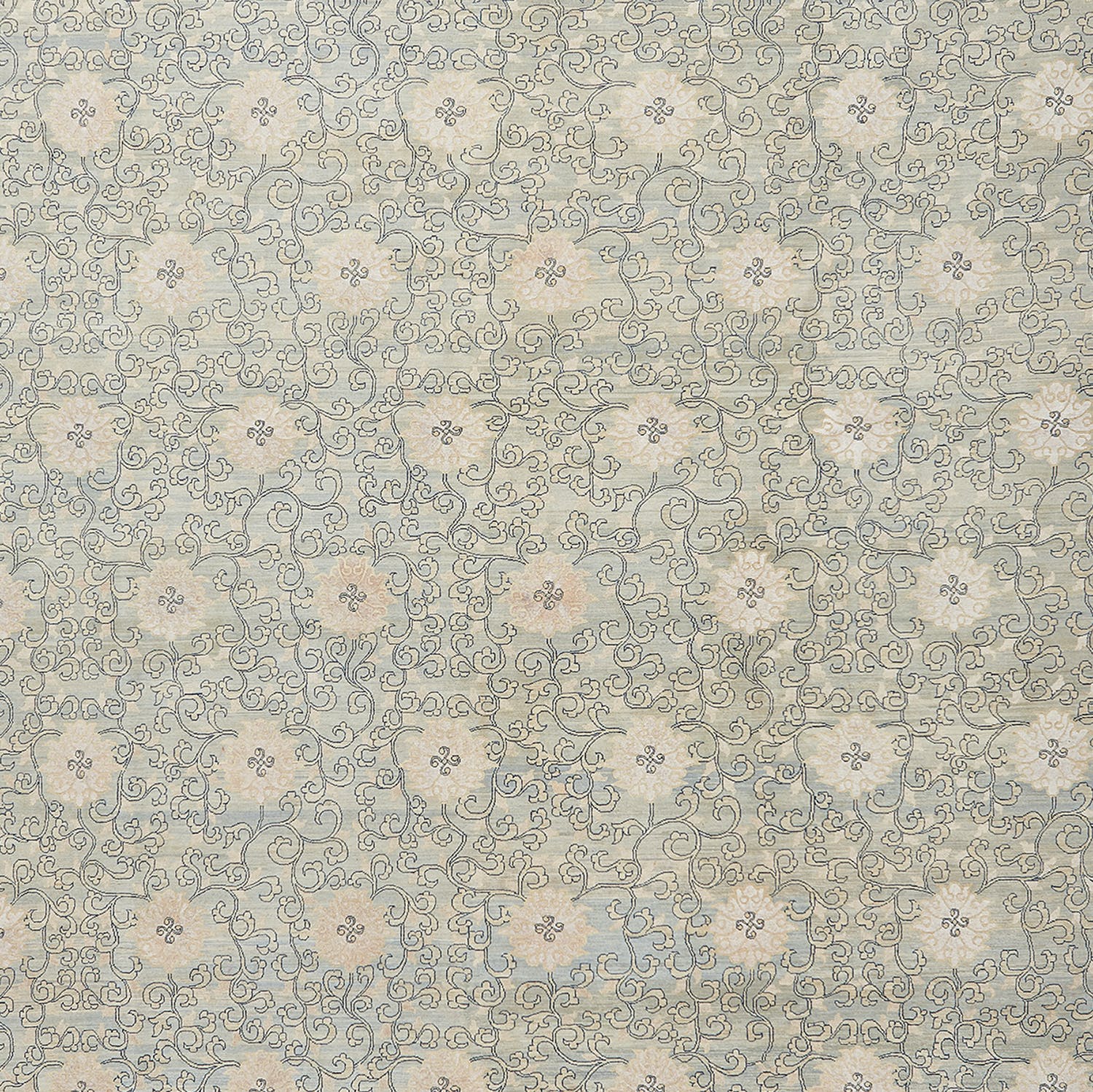 An elegant vintage patterned fabric with intricate swirls and foliage.